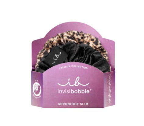 Zwei elegante invisibobble SPRUNCHIE SLIM Haargummis mit Stoffüberzug, spiralform, haarschonend und in edlem Design – ideal für feines Haar.