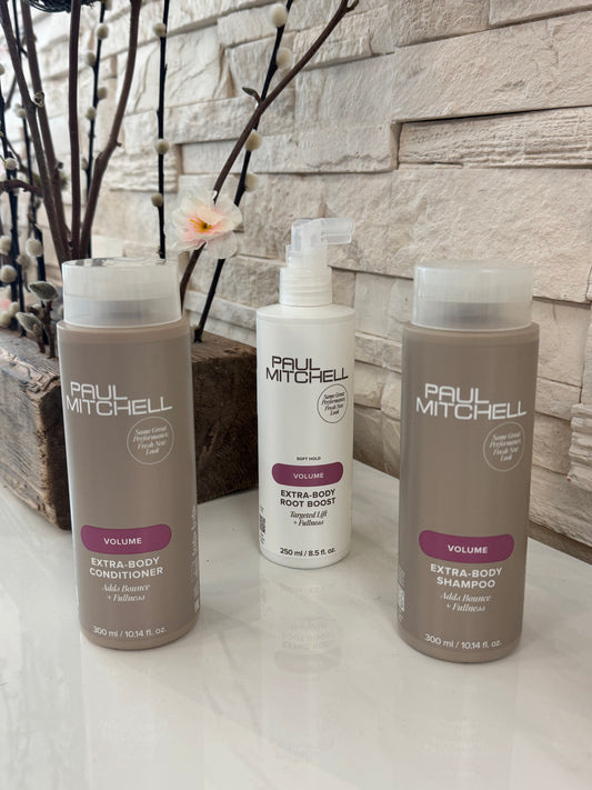 Paul Mitchell Extra-Body Shampoo und Conditioner für mehr Volumen bei feinem Haar, Produktset auf hellem Untergrund – Paul Mitchell