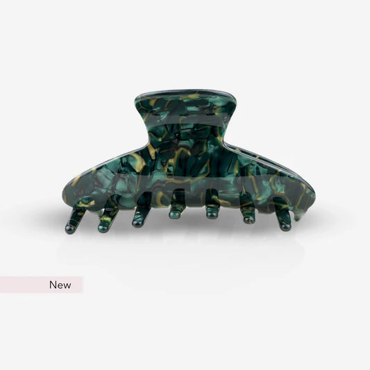 Elegante Haarklammer in Dunkelgrün aus Cellulose Acetat, Frontansicht mit sanft geschwungenem Design, SASSTIE