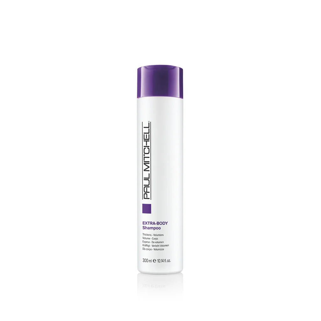 Extra Body Shampoo Volumen Shampoo für feines Haar, weiße Produktflasche mit violettem Akzent vor hellem Hintergrund, Paul Mitchell