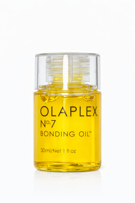 Olaplex No.7 Bonding Oil Glasflasche mit goldenem Haaröl auf weißem Hintergrund – Olaplex