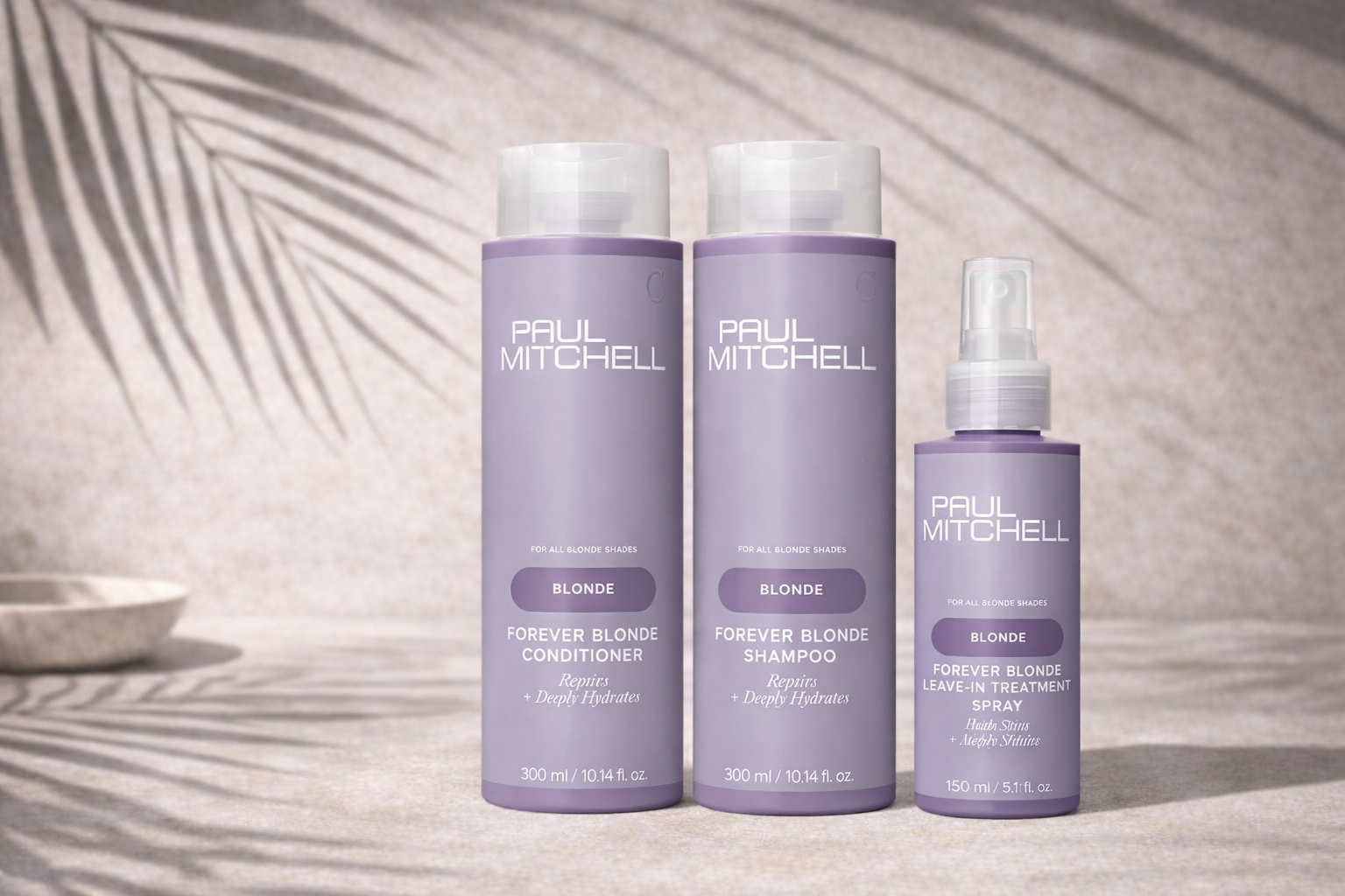 Paul Mitchell Forever Blonde Haarpflege Set mit Shampoo, Conditioner und Leave in Spray für blondes Haar, reparierende Pflege für Feuchtigkeit und Glanz, Produkte im stilvollen Setting – Paul Mitchell