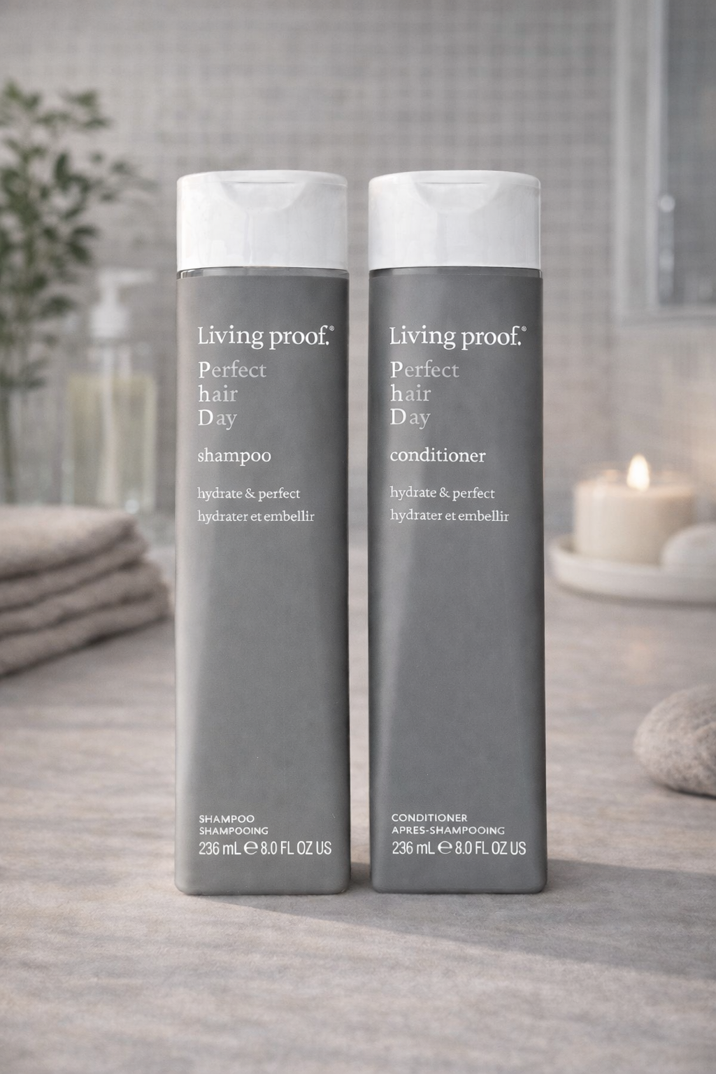 Living Proof Perfect Hair Day Shampoo und Conditioner dekorativer Hintergrund mit ruhiger Lichtstimmung – Living Proof